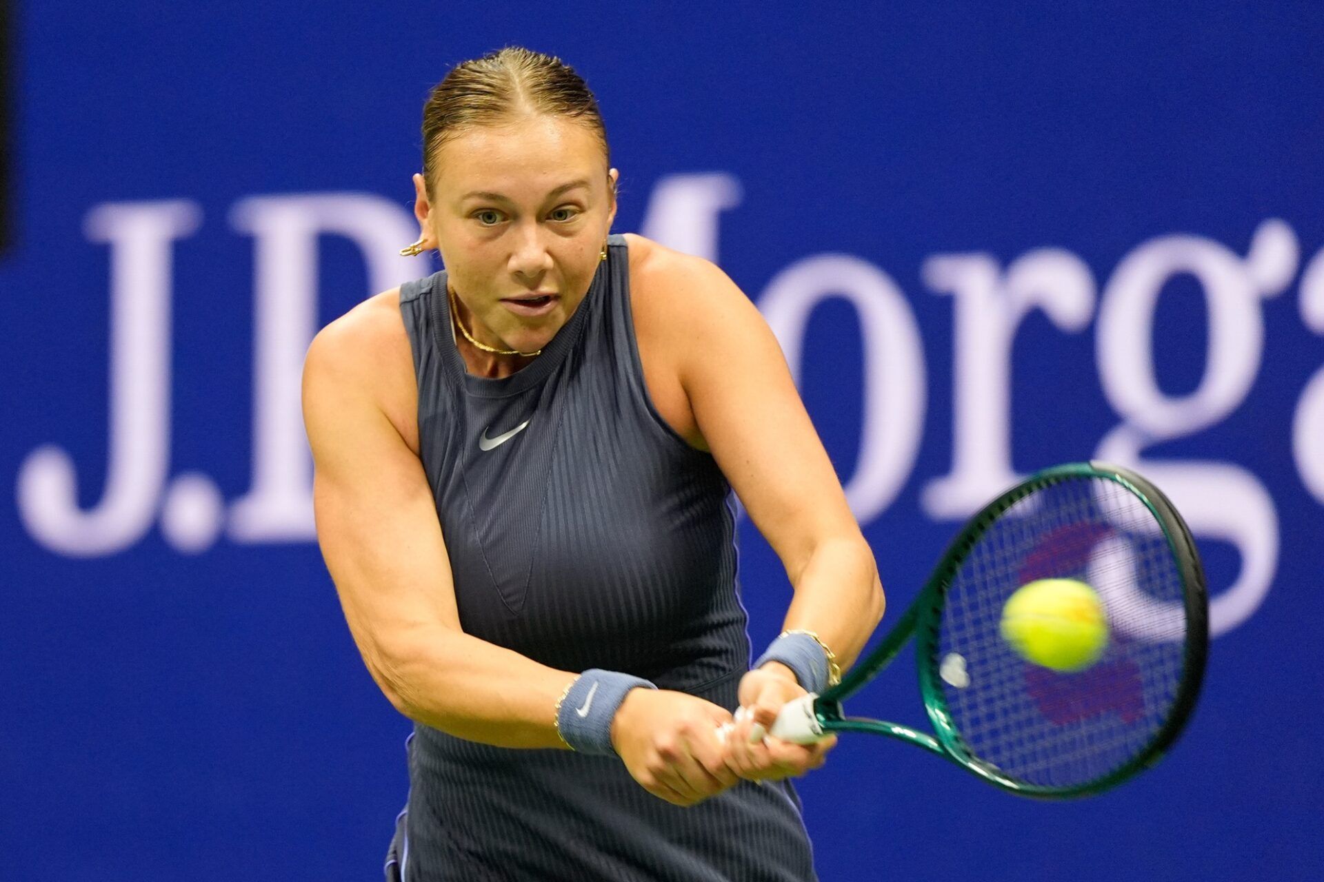 Amanda Anisimova (USA) hits a backhand against Aryna Sabalenka (not pictured) in the women's singles final of the 2025 US Open tennis championships at Billie Jean King National Tennis Center.