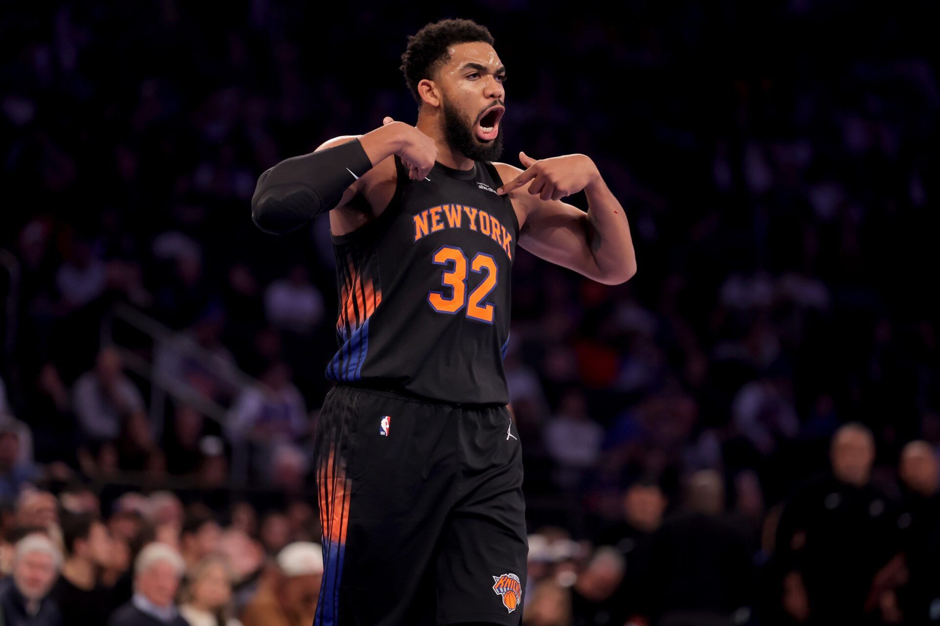 New York Knicks center Karl-Anthony Towns (32) reacts during the first quarter against the Miami Heat at Madison Square Garden.
