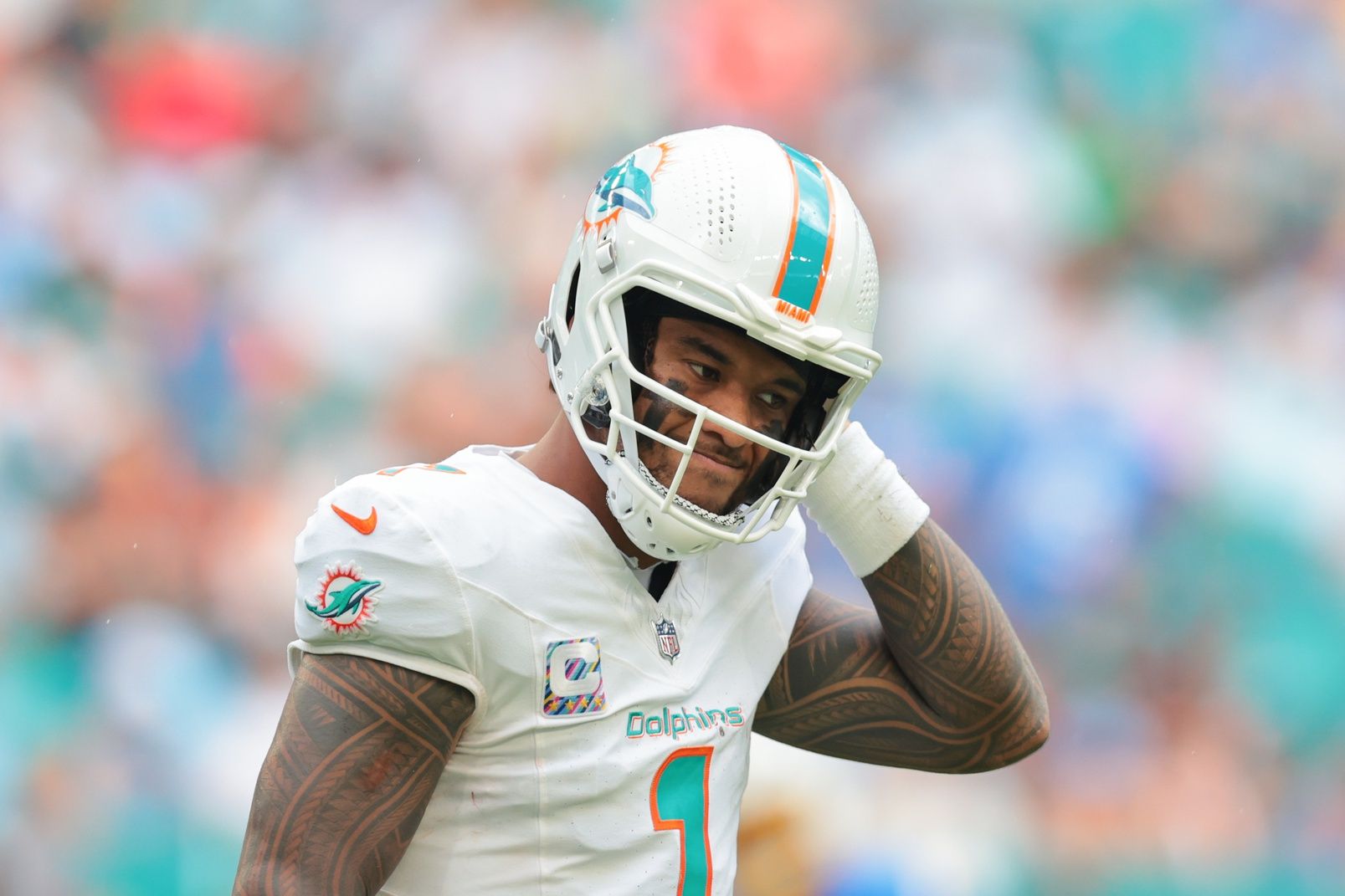 Miami Dolphins quarterback Tua Tagovailoa (1) reacts on the field against the Los Angeles Chargers during the third quarter at Hard Rock Stadium.