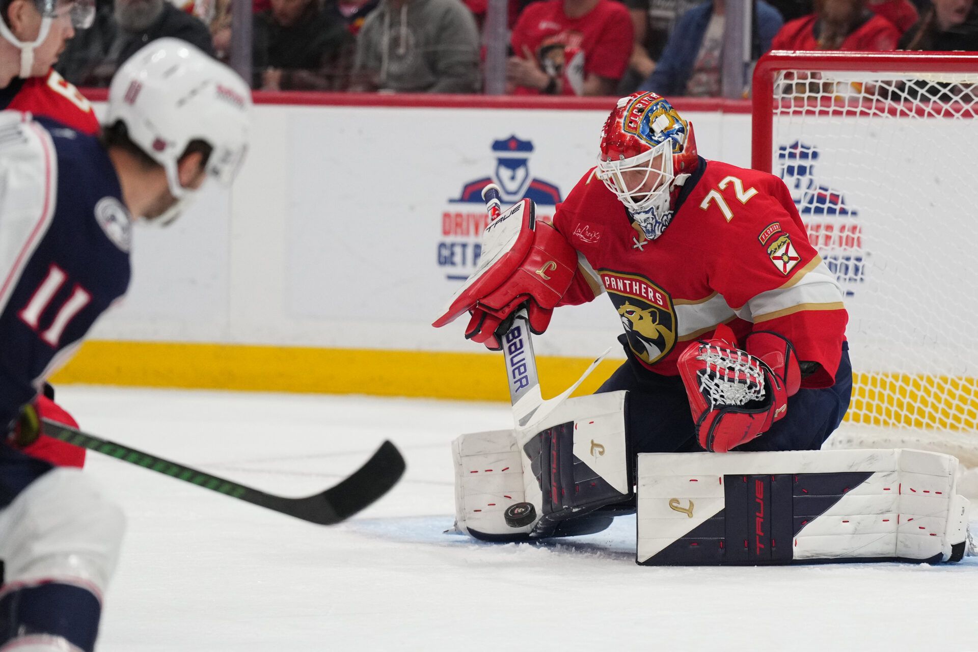 Florida Panthers goaltender Sergei Bobrovsky (72) makes a save against the Columbus Blue Jacket during the first period at Amerant Bank Arena.