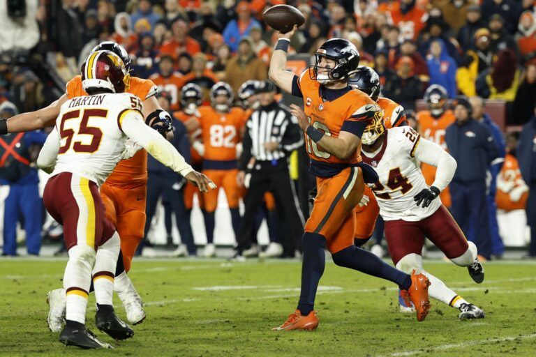 Denver Broncos quarterback Bo Nix (10) passes the ball as Washington Commanders defensive end Jacob Martin (55) and Washington Commanders linebacker Von Miller (24) defend in the fourth quarter at Northwest Stadium.