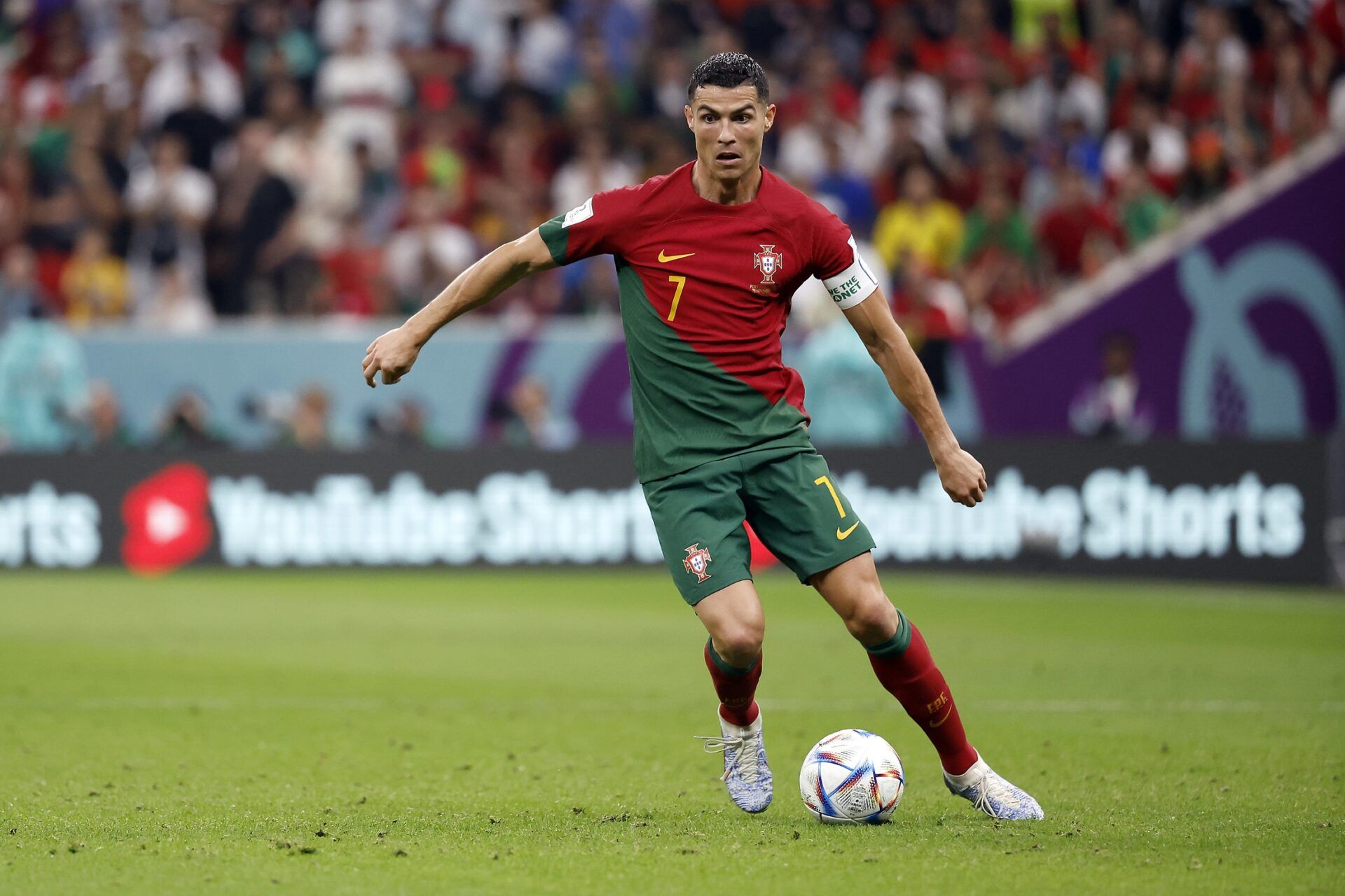 Portugal forward Cristiano Ronaldo (7) moves the ball against Uruguay during the second half of the group stage match in the 2022 World Cup at Lusail Stadium.