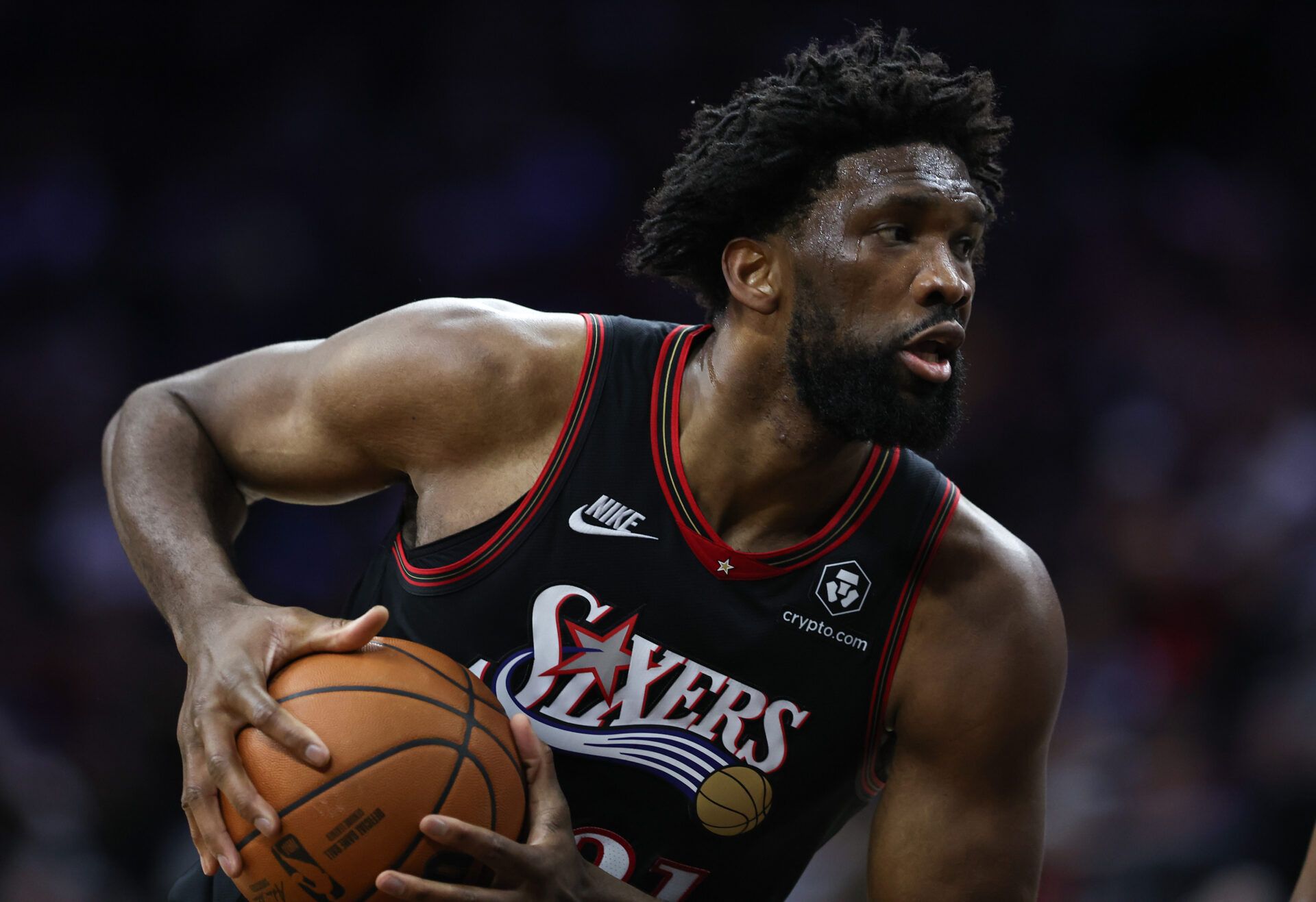 Philadelphia 76ers center Joel Embiid (21) controls the ball against the Golden State Warriors during the second quarter at Xfinity Mobile Arena.