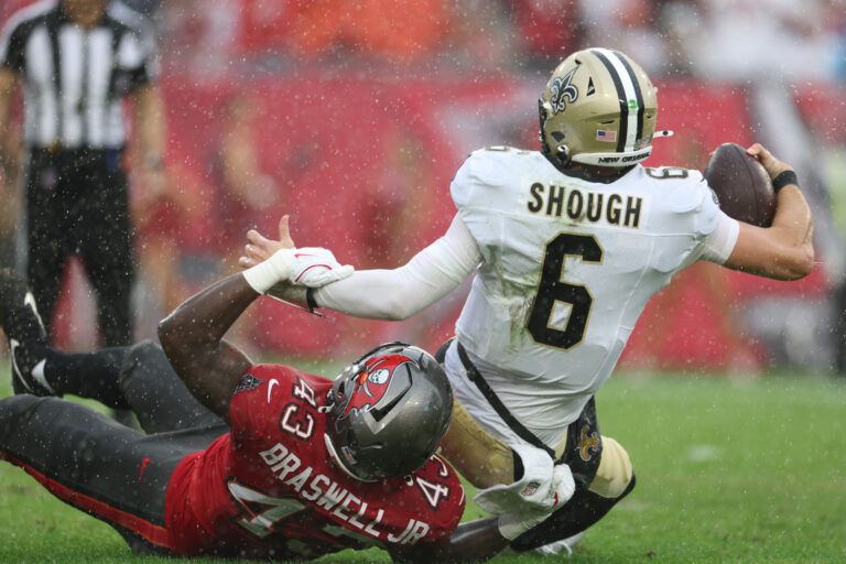New Orleans Saints quarterback Tyler Shough (6) is sacked by Tampa Bay Buccaneers linebacker Chris Braswell (43) during the second quarter at Raymond James Stadium.