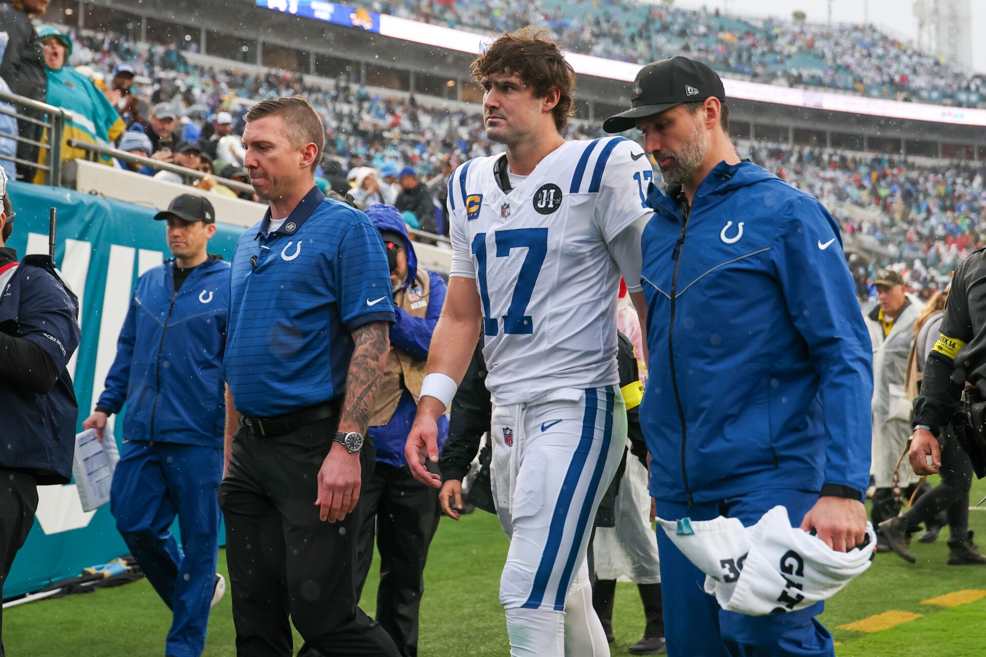 Indianapolis Colts quarterback Daniel Jones (17) leaves the field with an apparent injury against the Jacksonville Jaguars during the first half at EverBank Stadium.