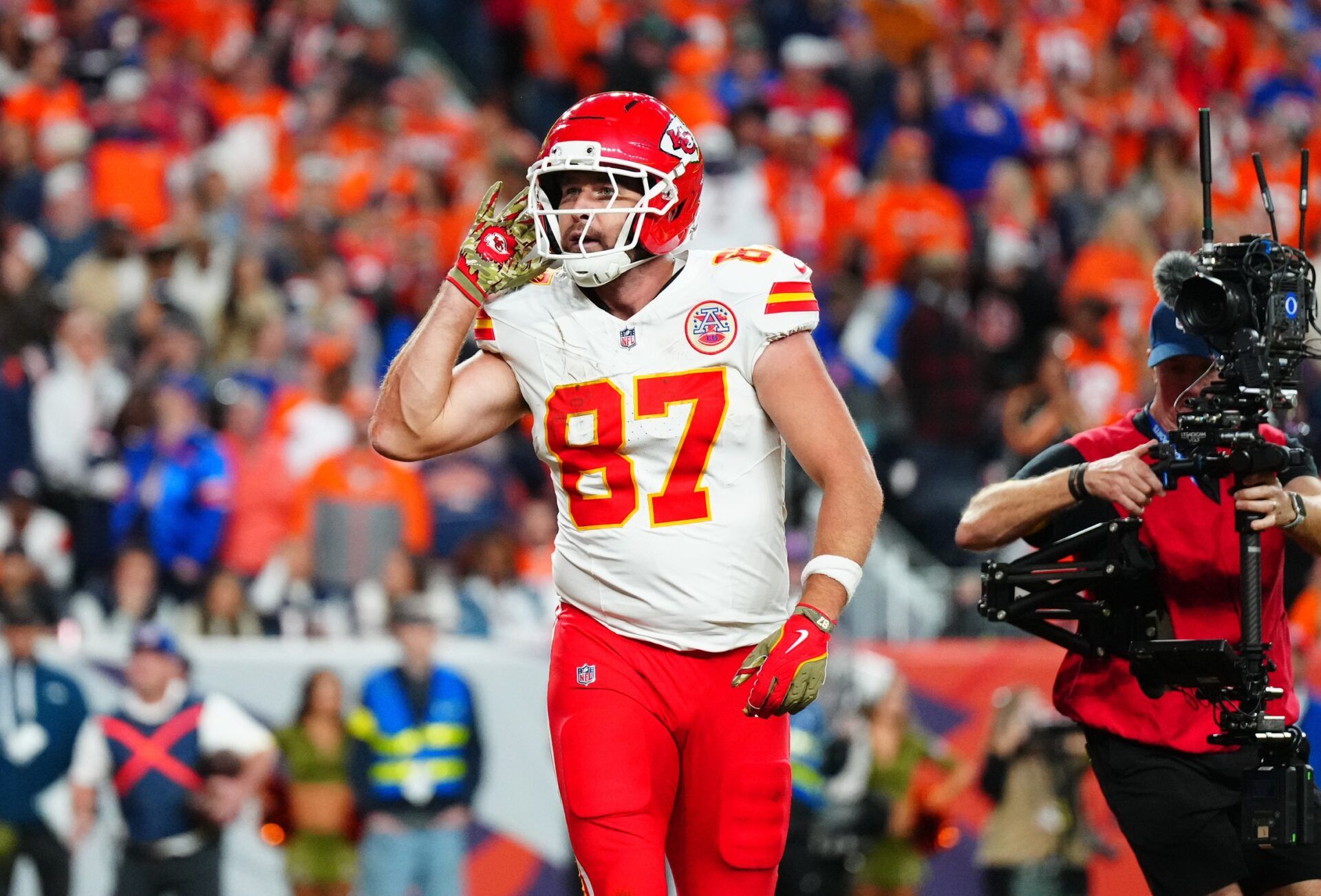 Kansas City Chiefs tight end Travis Kelce (87) reacts after his touchdown in the fourth quarter against the Denver Broncos at Empower Field at Mile High.