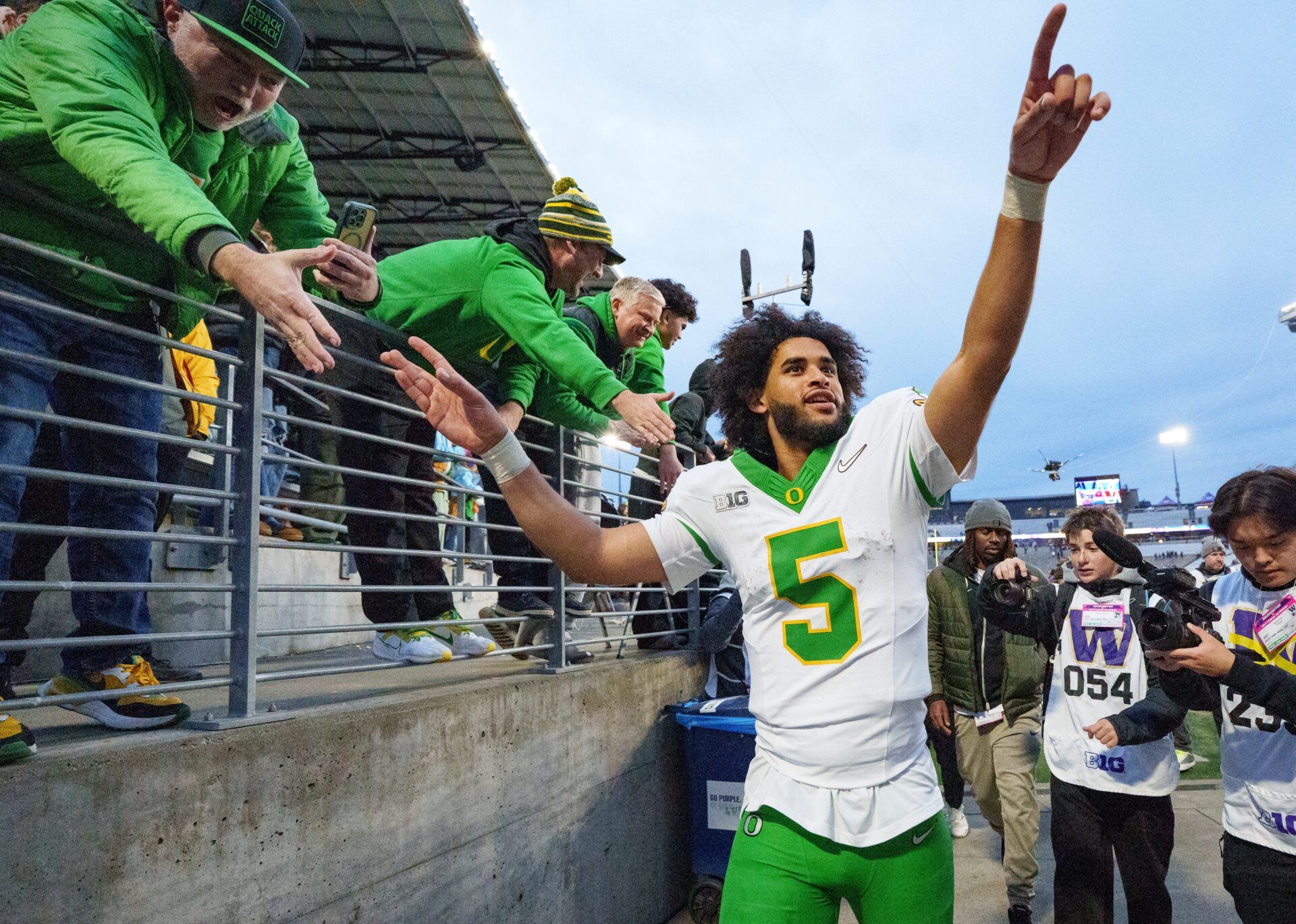 Oregon quarterback Dante Moore celebrates after the game as the Oregon Ducks take on the Washington Huskies on Nov. 29, 2025, at Husky Stadium in Seattle, Washington.
