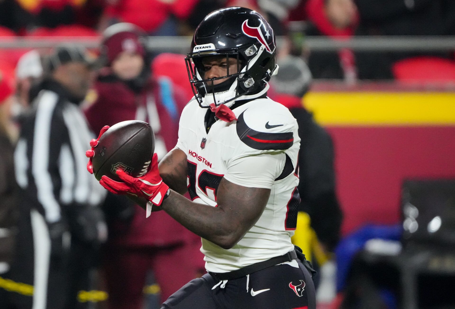 Houston Texans running back Woody Marks (27) warms up prior to the game against the Kansas City Chiefs at GEHA Field at Arrowhead Stadium.