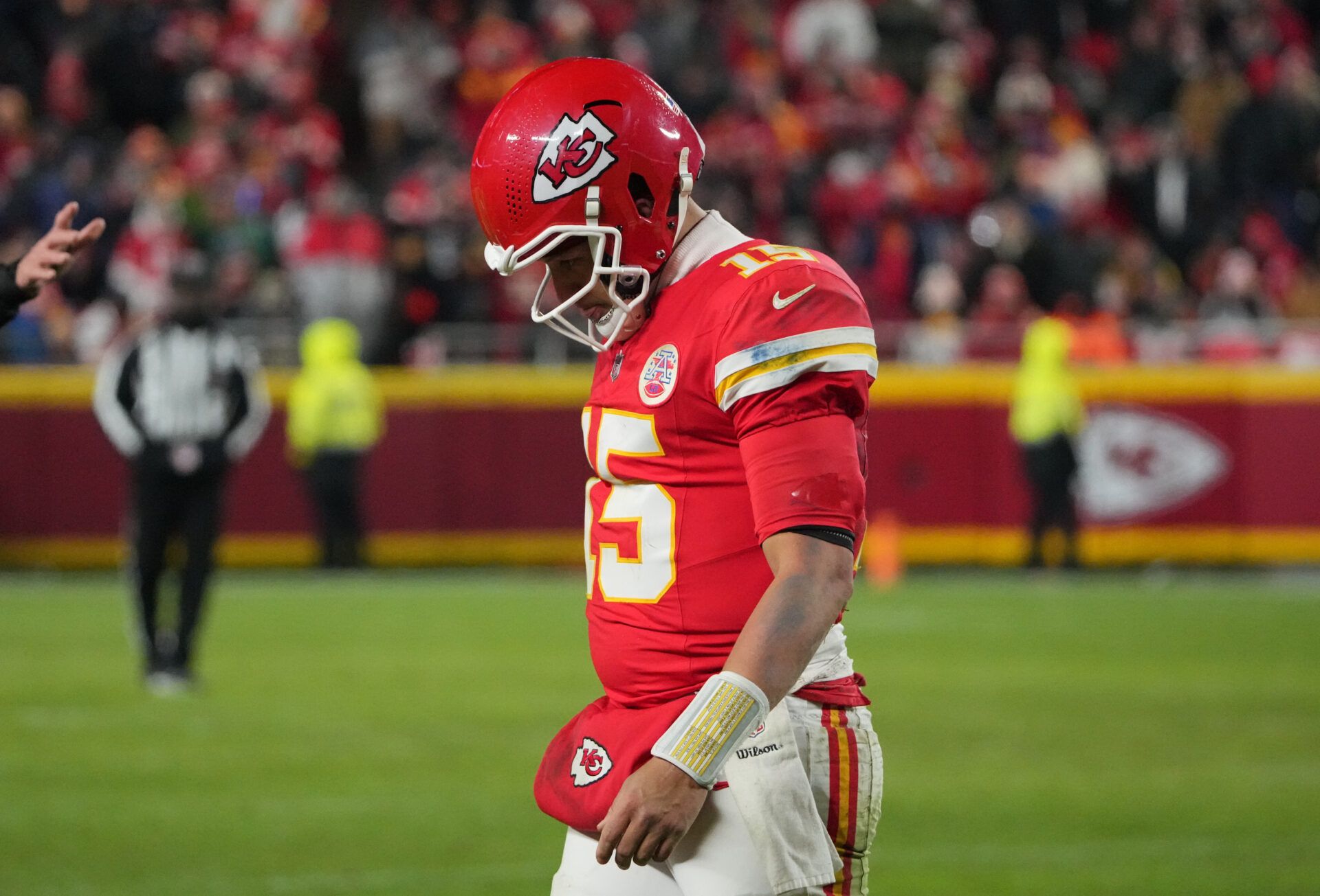 Kansas City Chiefs quarterback Patrick Mahomes (15) lowers his head during the fourth quarter against the Houston Texans at GEHA Field at Arrowhead Stadium.