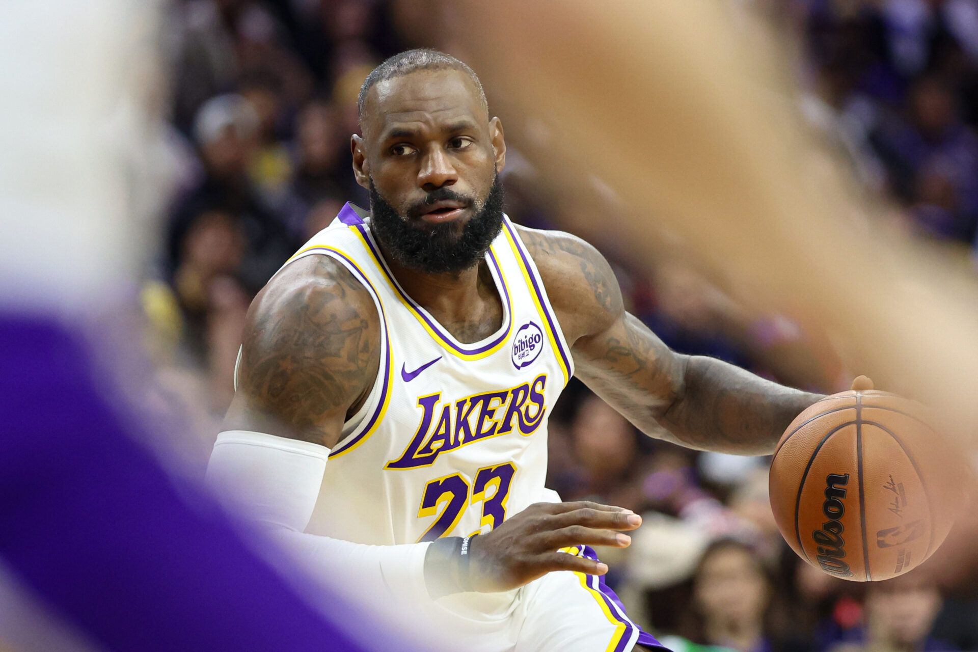 Los Angeles Lakers forward Lebron James (23) dribbles the ball against the Philadelphia 76ers during the fourth quarter at Xfinity Mobile Arena.
