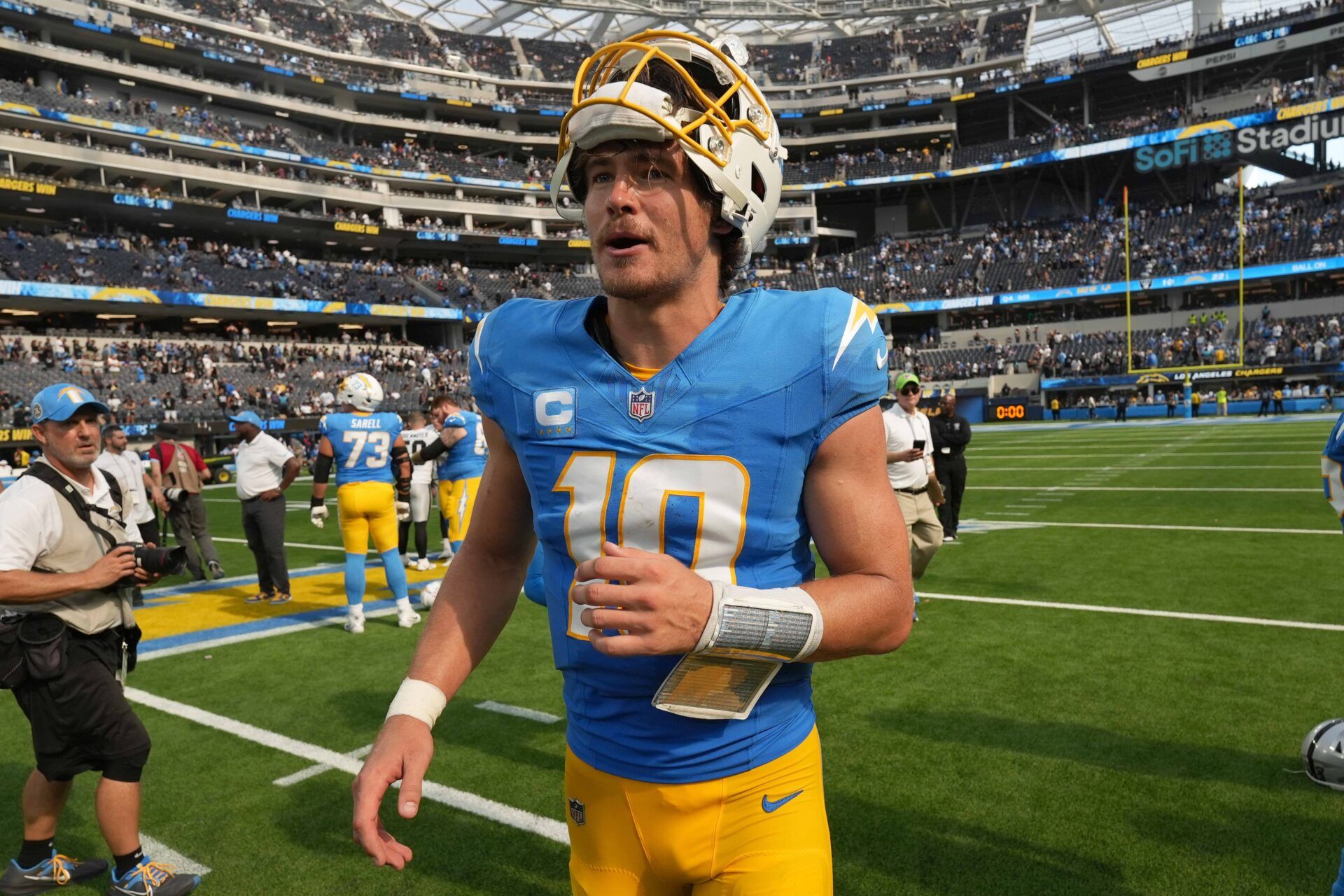 Los Angeles Chargers quarterback Justin Herbert (10) reacts after the game against the Las Vegas Raiders at SoFi Stadium.