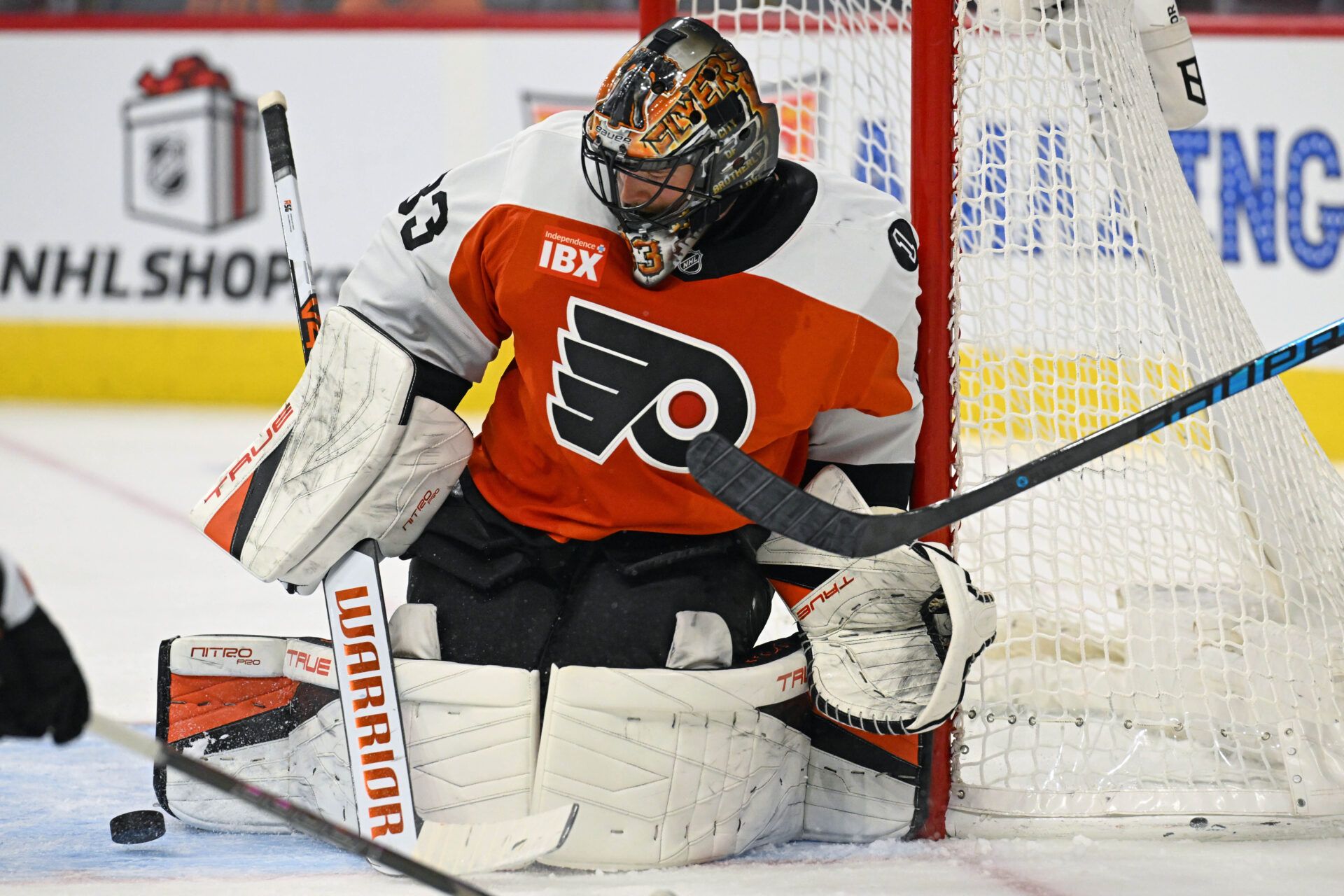 Philadelphia Flyers goaltender Samuel Ersson (33) makes a save against the Colorado Avalanche during the second period at Xfinity Mobile Arena.
