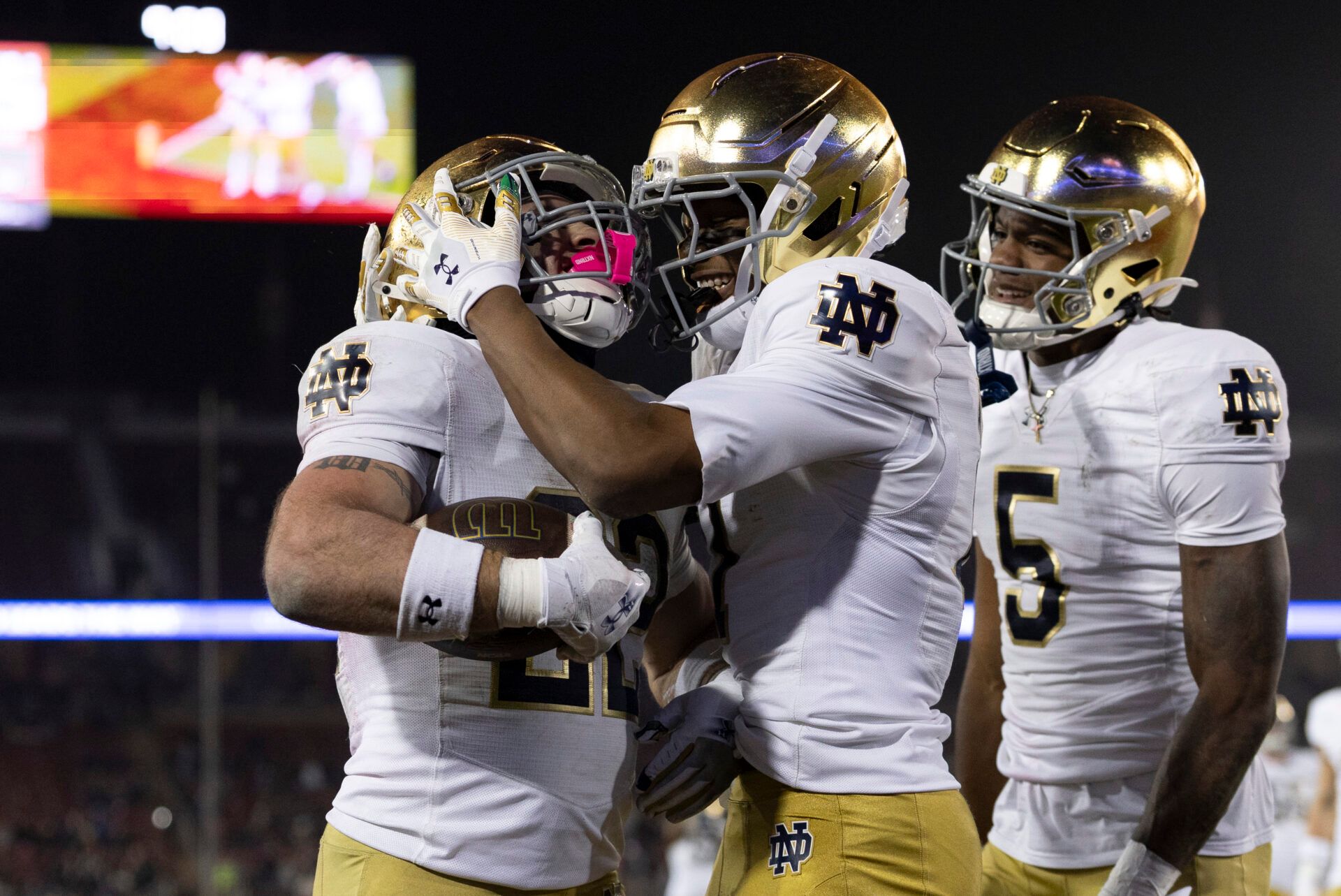 Notre Dame Fighting Irish running back Aneyas Williams (22) celebrates with Notre Dame Fighting Irish tight end Ty Washington (7) after scoring a touchdown during the fourth quarter against the Stanford Cardinal at Stanford Stadium.