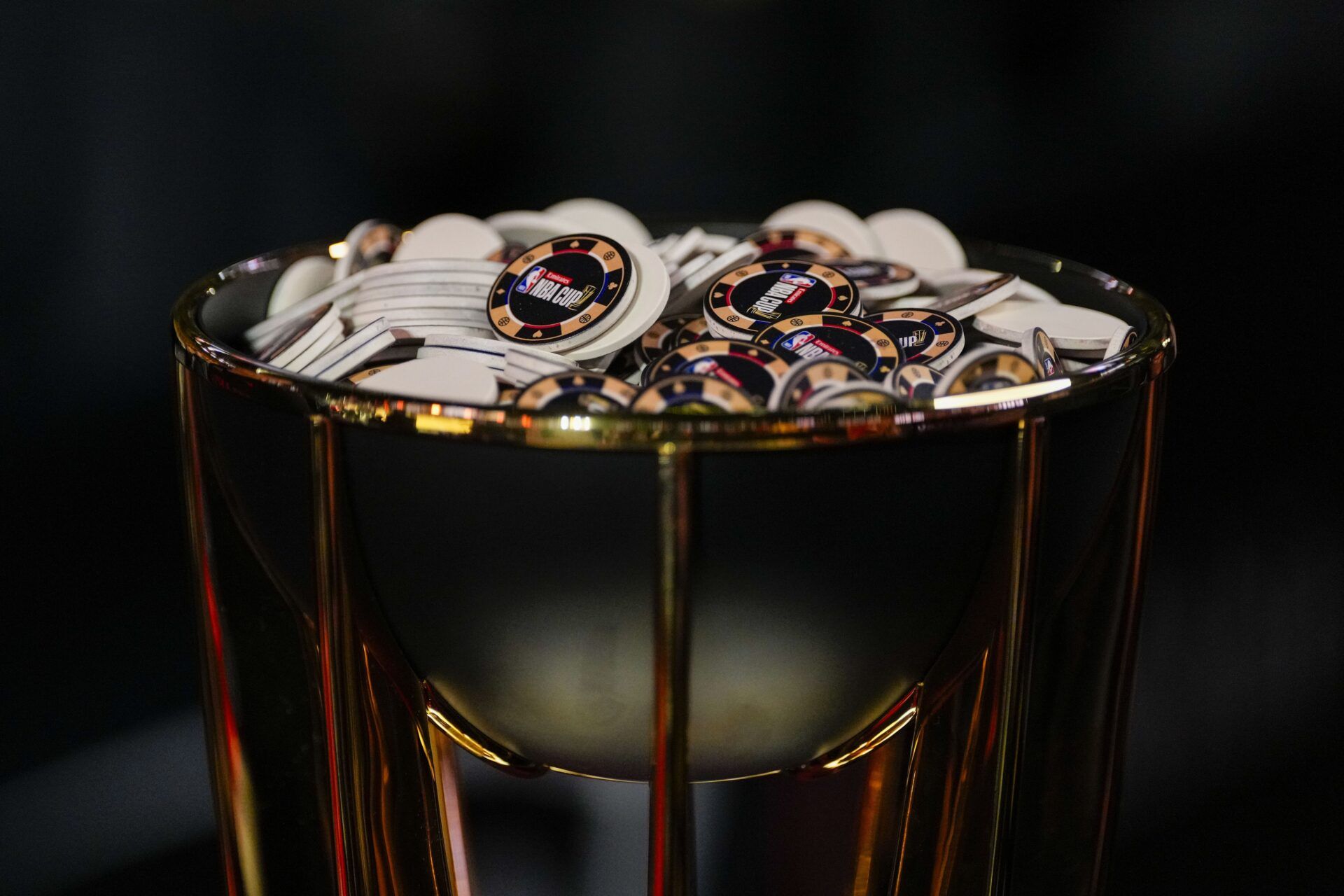 Gambling chips in the top of the trophy during practice prior to the Emirates NBA Cup semi-finals at T-Mobile Arena.