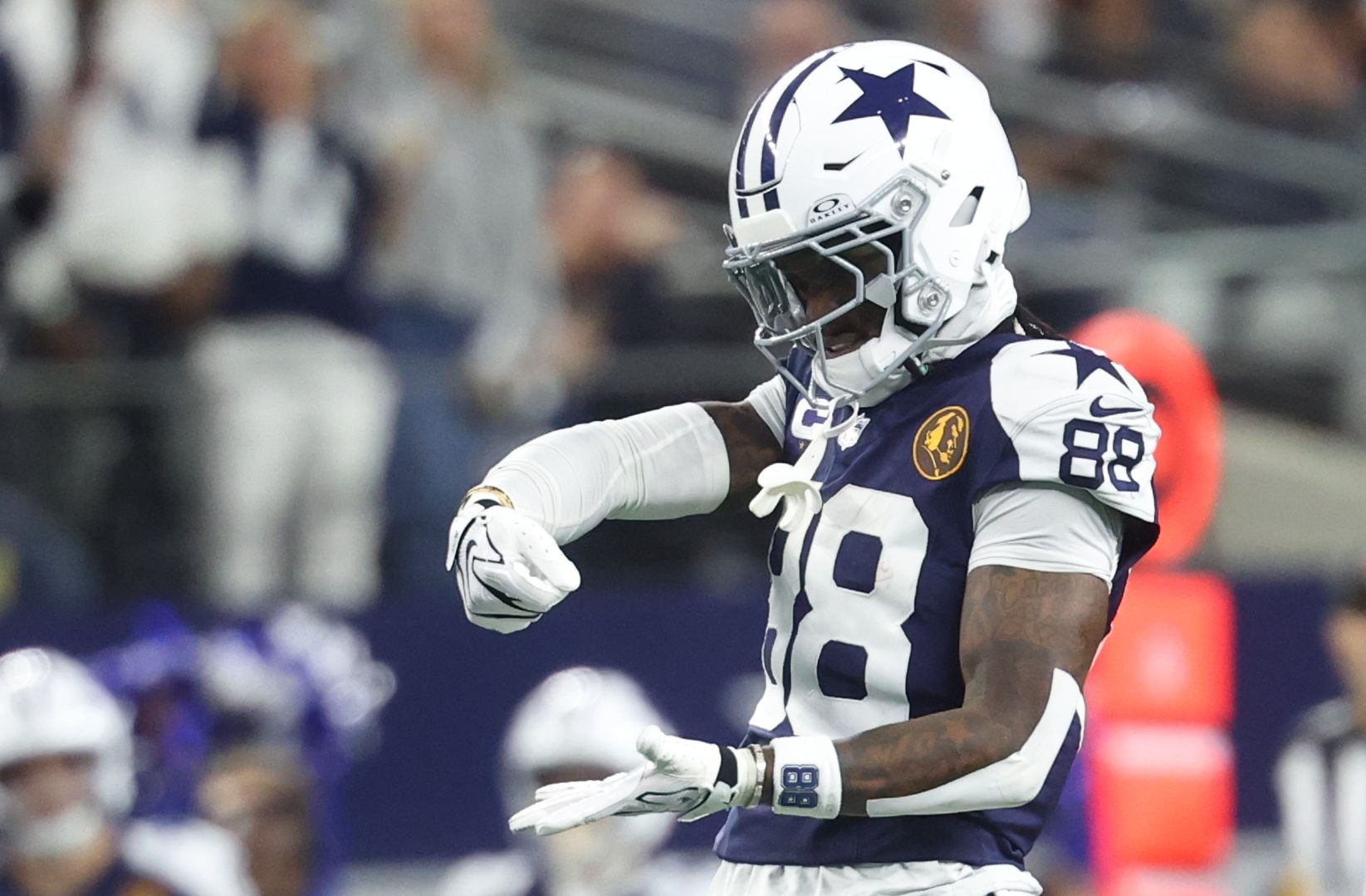 Dallas Cowboys wide receiver CeeDee Lamb (88) celebrates after catching a pass against the Kansas City Chiefs during the fourth quarter at AT&T Stadium.