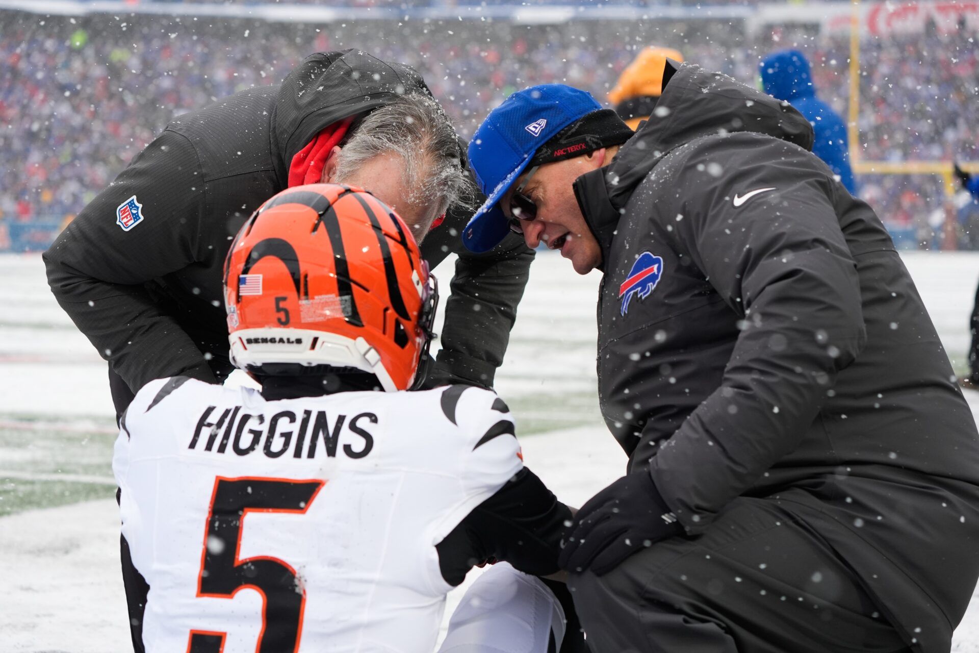 Cincinnati Bengals wide receiver Tee Higgins (5) is attended to by medical staff in the second quarter against the Buffalo Bills at Highmark Stadium.