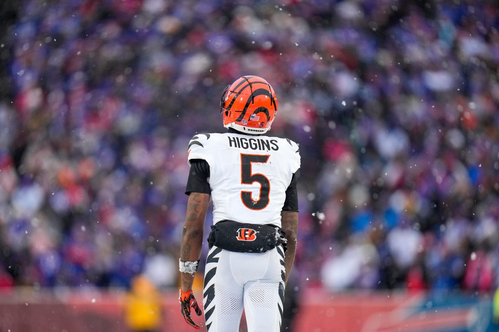Cincinnati Bengals wide receiver Tee Higgins (5) walks for the sideline after hitting his head for a second time in the fourth quarter of the NFL Week 14 game between the Buffalo Bills and the Cincinnati Bengals at Highmark Stadium in Orchard Park, N.Y., on Sunday, Dec. 7, 2025. The Bills overcame a halftime deficit to win 39-34.