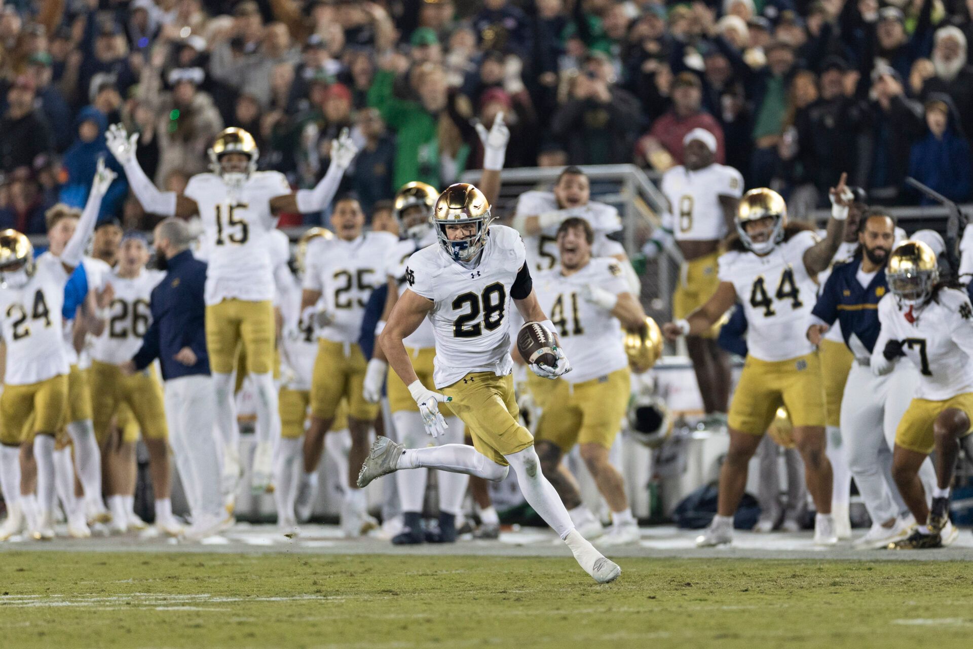 Notre Dame Fighting Irish safety Luke Talich (28) runs for a touchdown on a fake punt against the Stanford Cardinal during the second quarter at Stanford Stadium.