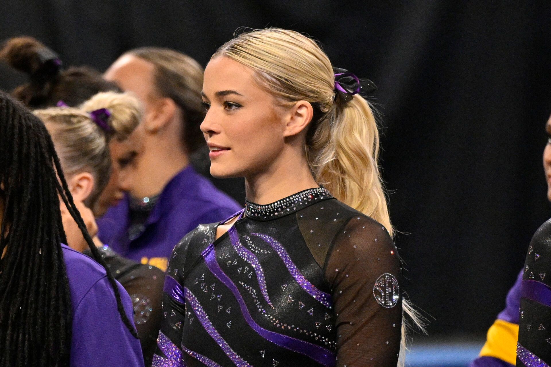 LSU Tigers gymnast Olivia Dunne cheers for the LSU gymnastic team during the 2025 Women's National Gymnastics Semifinal at Dickies Arena.