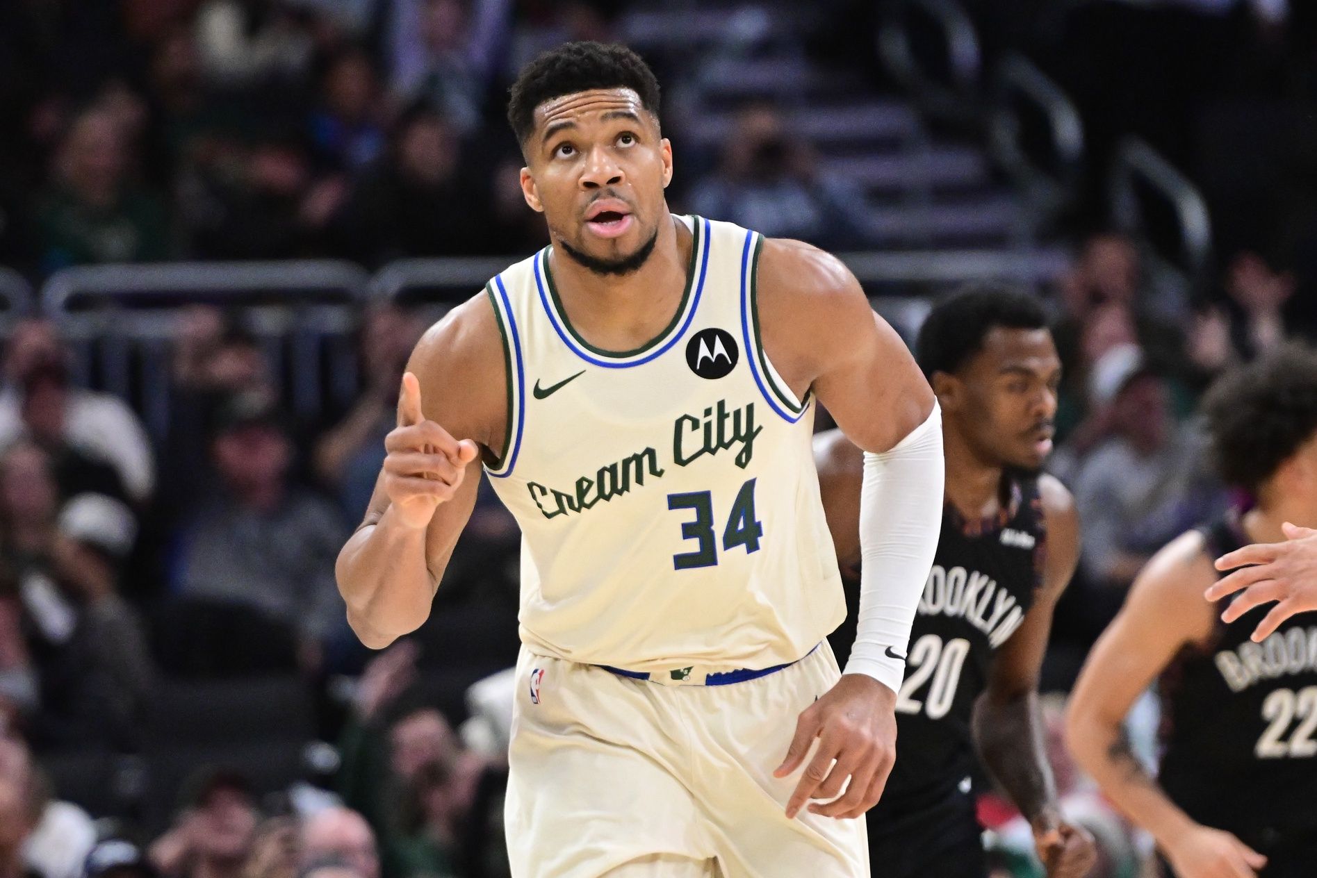 Milwaukee Bucks forward Giannis Antetokounmpo (34) reacts after scoring his 21,000th career point in the third quarter against the Brooklyn Nets at Fiserv Forum.
