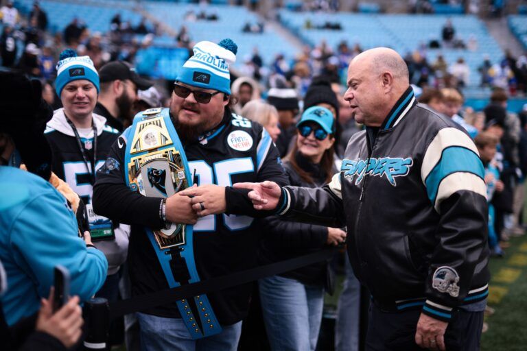 Carolina Panthers owner David Tepper greets fans before the game against the Los Angeles Rams at Bank of America Stadium.