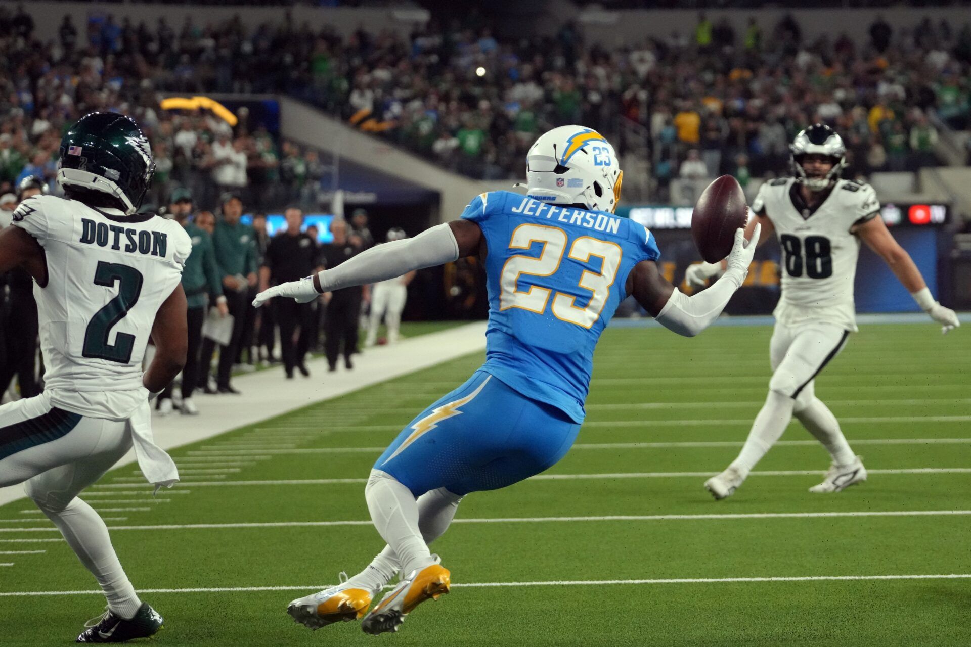 Los Angeles Chargers safety Tony Jefferson (23) intercepts a pass intended for Philadelphia Eagles wide receiver Jahan Dotson (2) in overtime at SoFi Stadium.