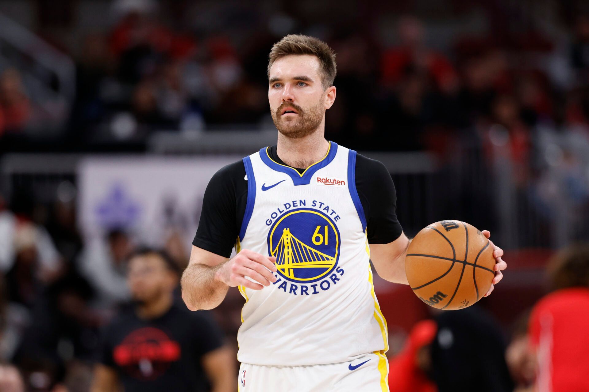Golden State Warriors guard Pat Spencer (61) brings the ball up court against the Chicago Bulls during the second half at United Center.