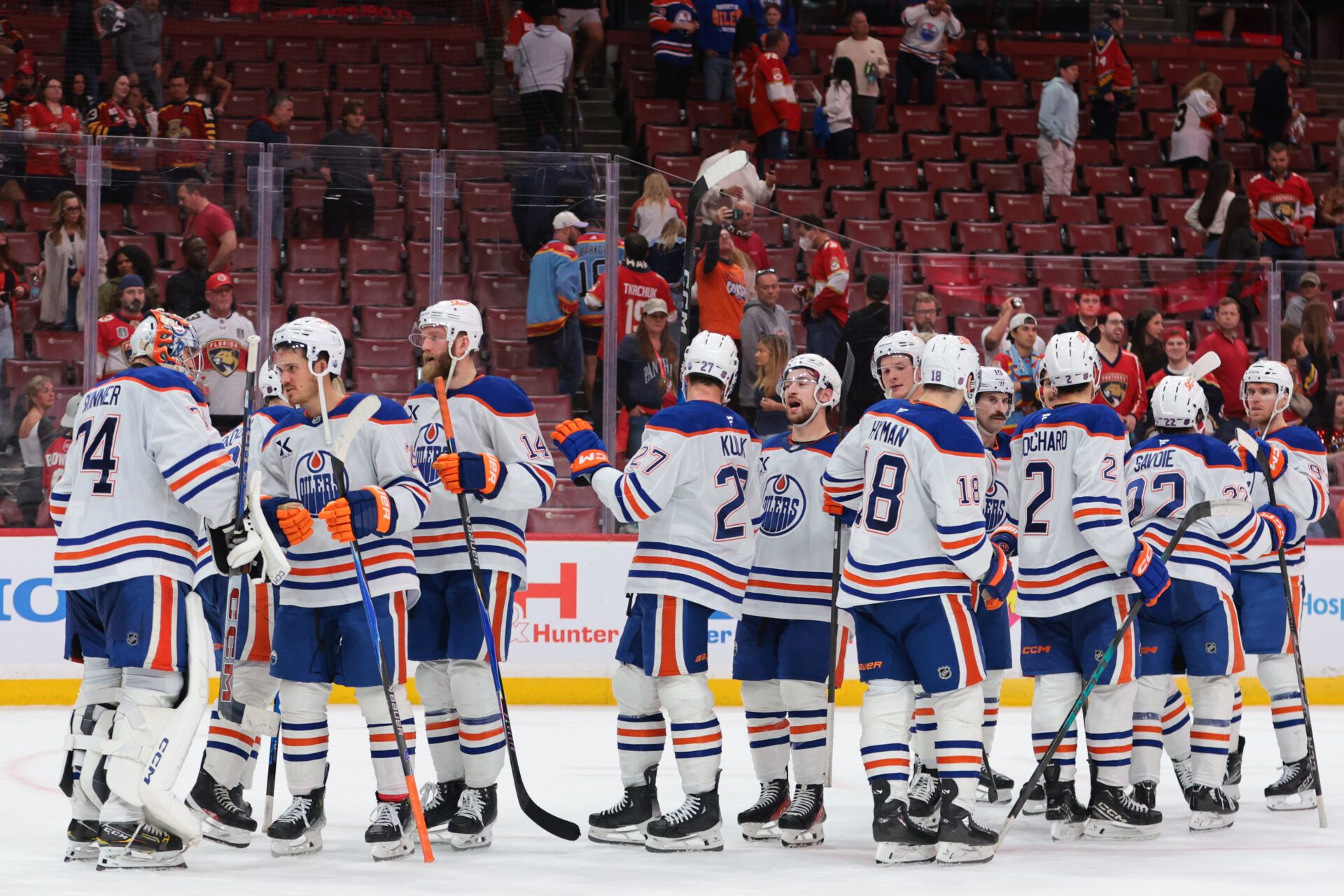 Edmonton Oilers players celebrate after the game against the Florida Panthers at Amerant Bank Arena.