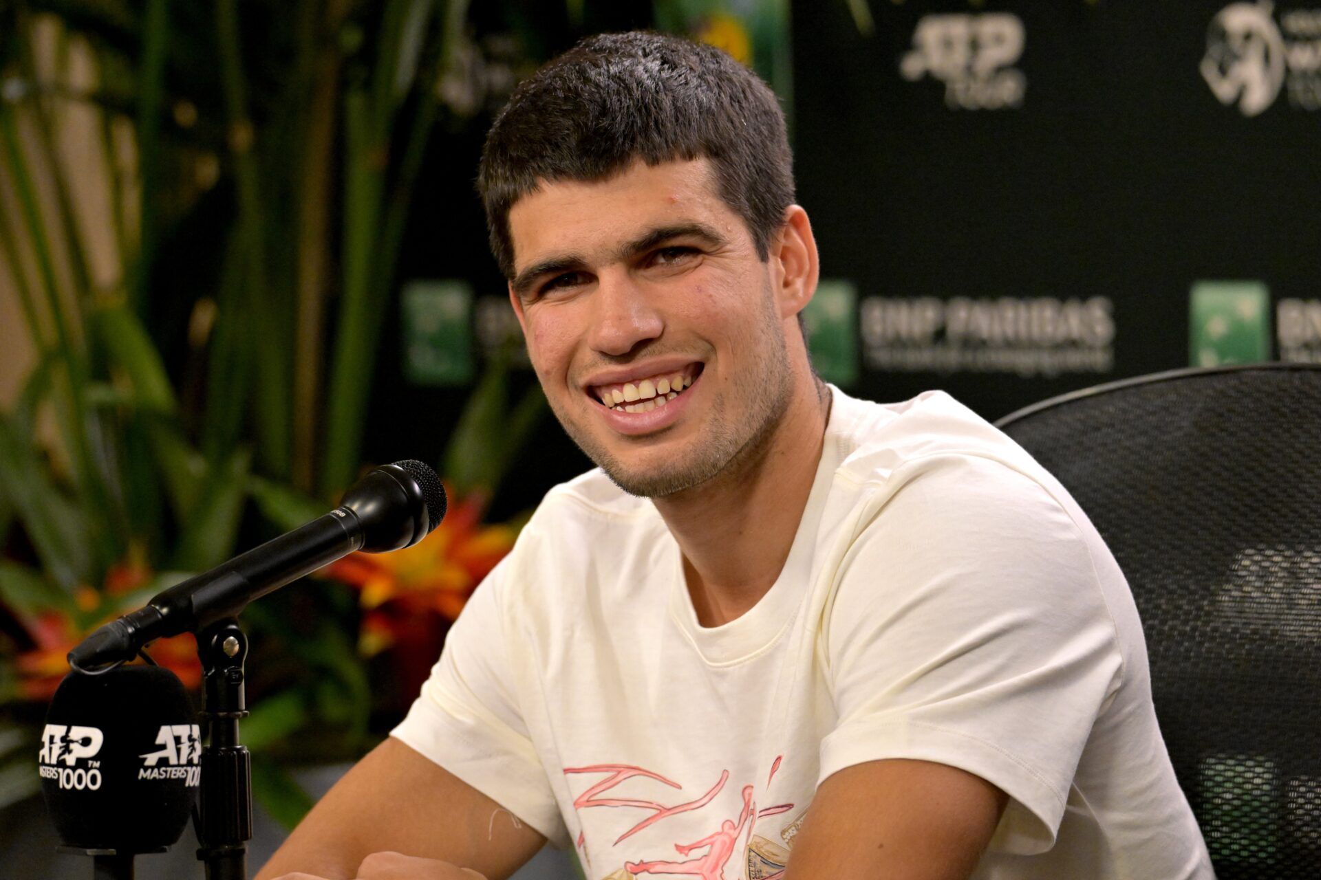 Carlos Alcaraz (ESP) answers questions from the media during a press conference during the BNP Paribas Open at the Indian Wells Tennis Garden.
