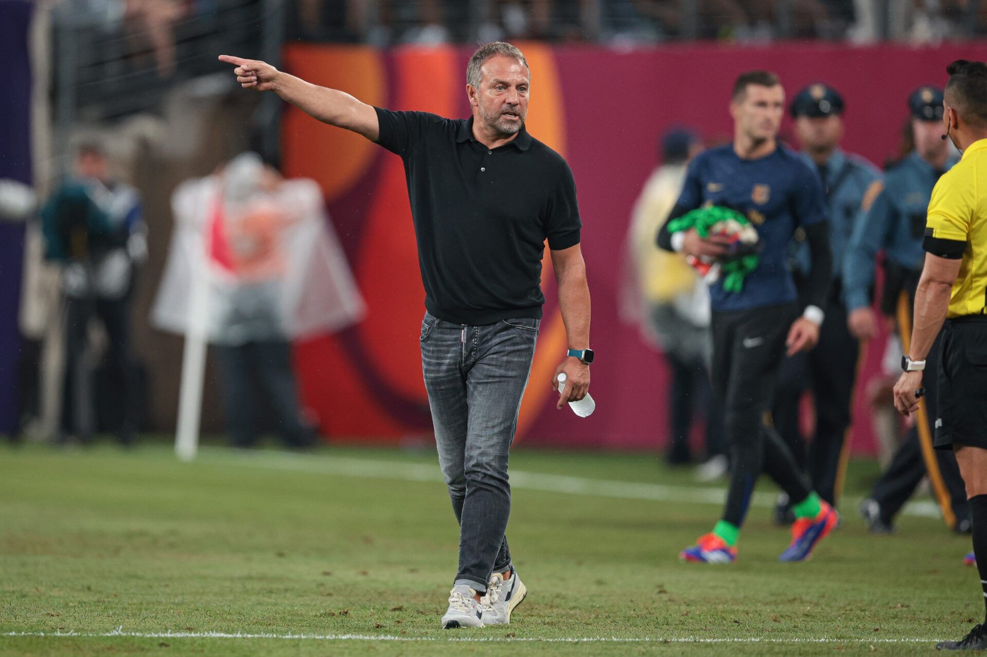 Barcelona head coach Hansi Flick walks off the pitch. (Image Credits: Vincent Carchietta-USA TODAY Sports)