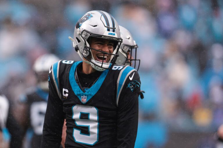 Carolina Panthers quarterback Bryce Young (9) celebrates after a touchdown during the third quarter against the Los Angeles Rams at Bank of America Stadium.