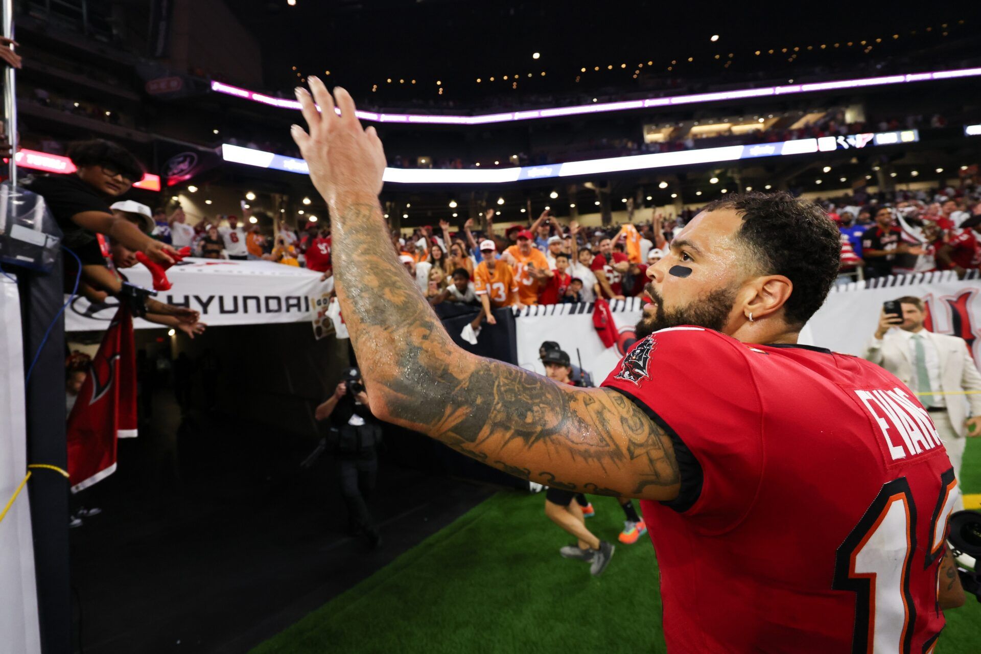 Tampa Bay Buccaneers wide receiver Mike Evans (13) waves to fans after the game against the Houston Texans at NRG Stadium.