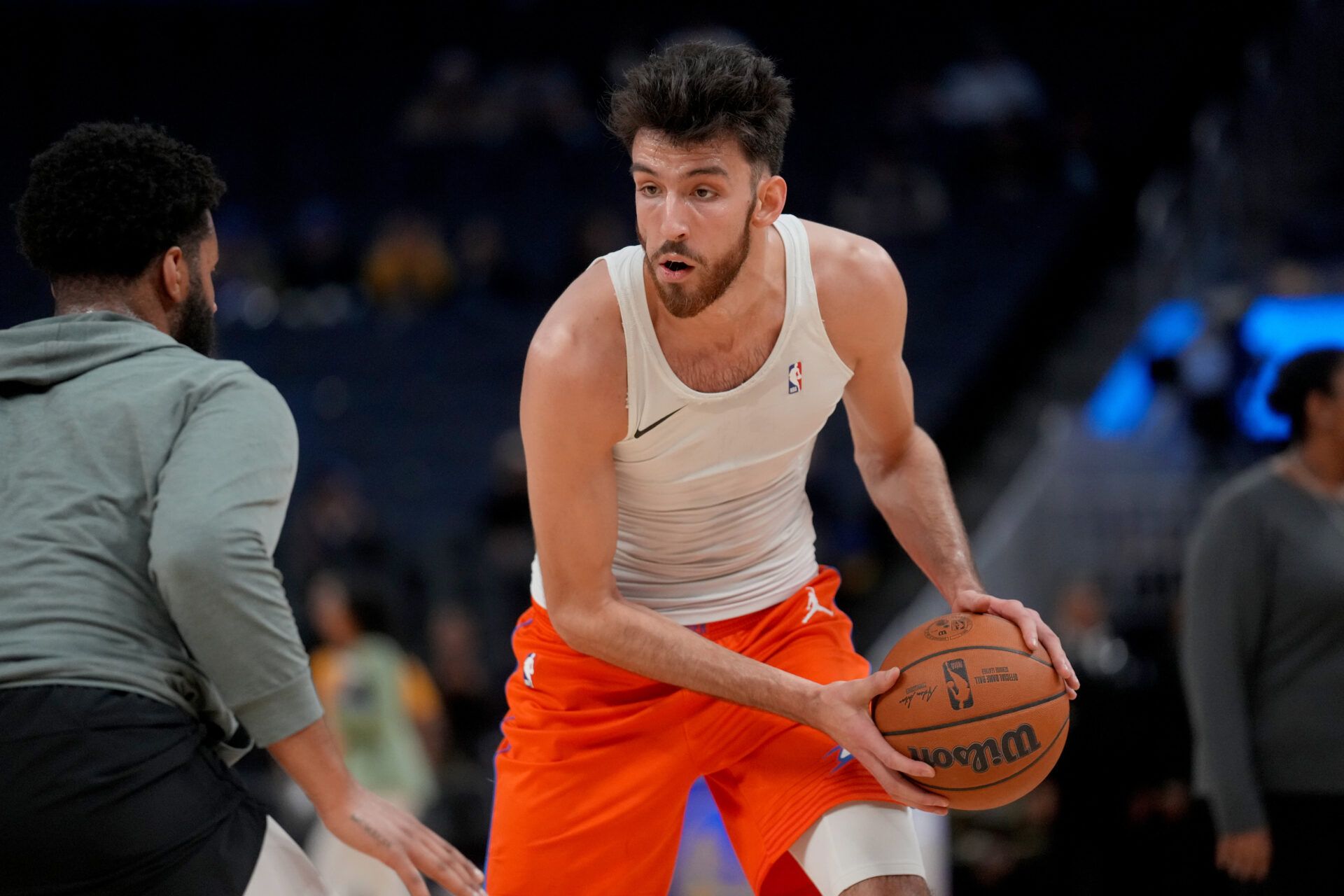 Oklahoma City Thunder center Chet Holmgren (7) warms up before the start of the game against the Golden State Warriors at the Chase Center.