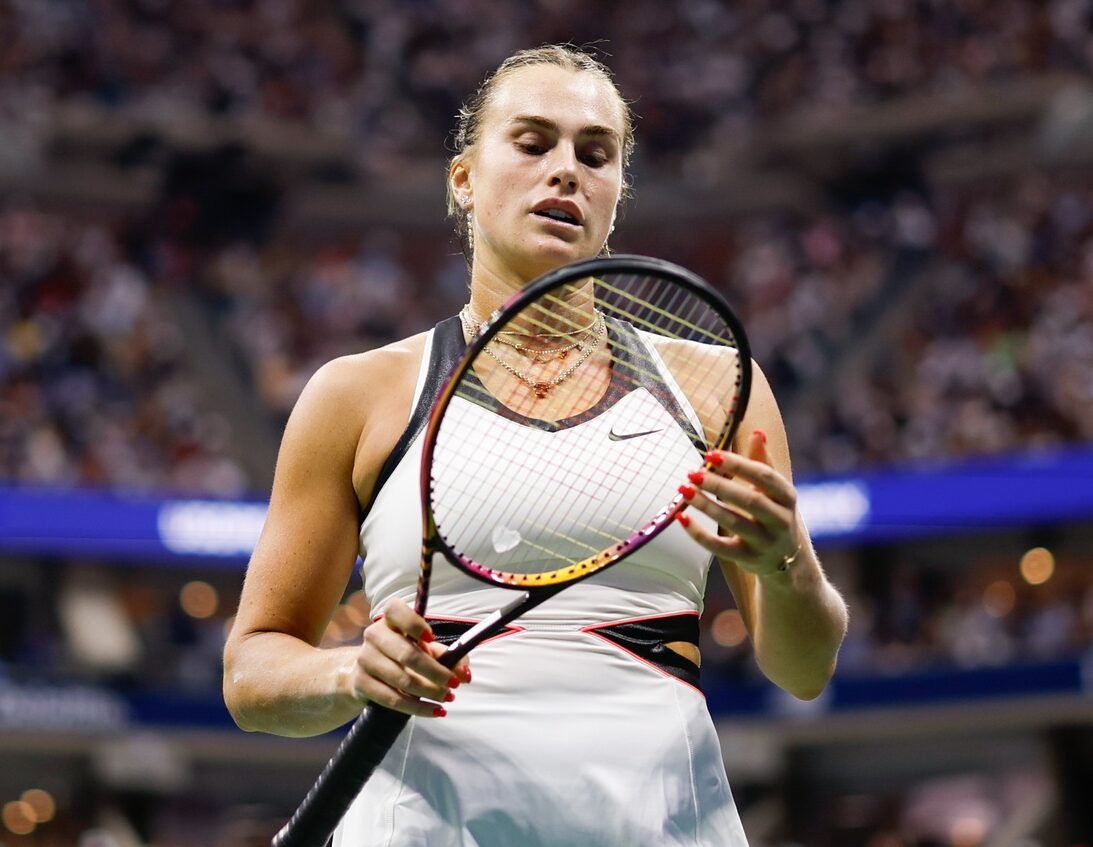 Aryna Sabalenka looks at her racket in the women's singles final against Amanda Anisimova (USA) (not pictured) of the 2025 US Open tennis championships at Billie Jean King National Tennis Center.