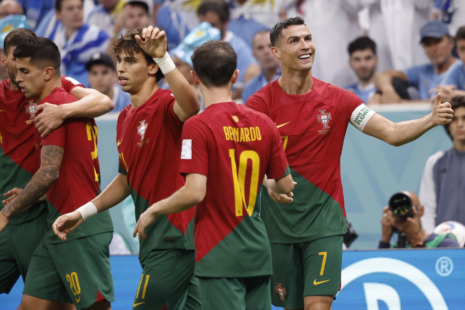 Portugal forward Cristiano Ronaldo (7) celebrates his goal scored against Uruguay during the second half of the group stage match in the 2022 World Cup at Lusail Stadium. The goal would instead be credited to midfielder Bruno Fernandes (8).