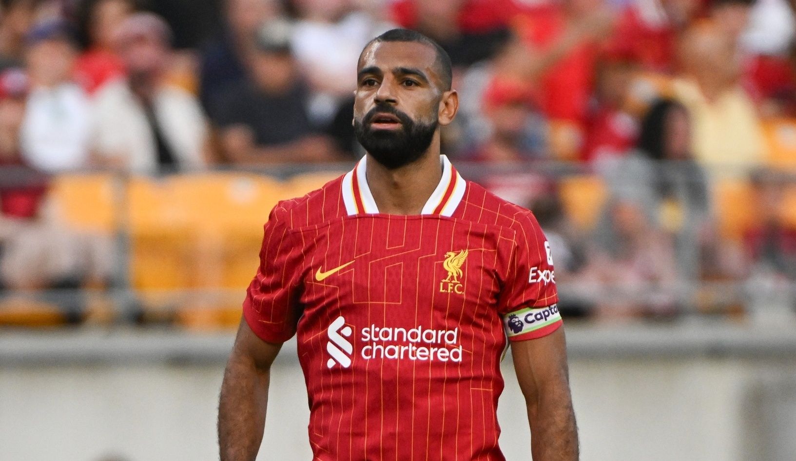 Liverpool forward Mohamed Salah (11) looks on against Real Betis during the first half at Acrisure Stadium.