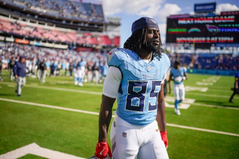 Tennessee Titans tight end Chig Okonkwo (85) exits the field after the game against the New England Patriots at Nissan Stadium in Nashville, Tenn., Sunday, Oct. 19, 2025.