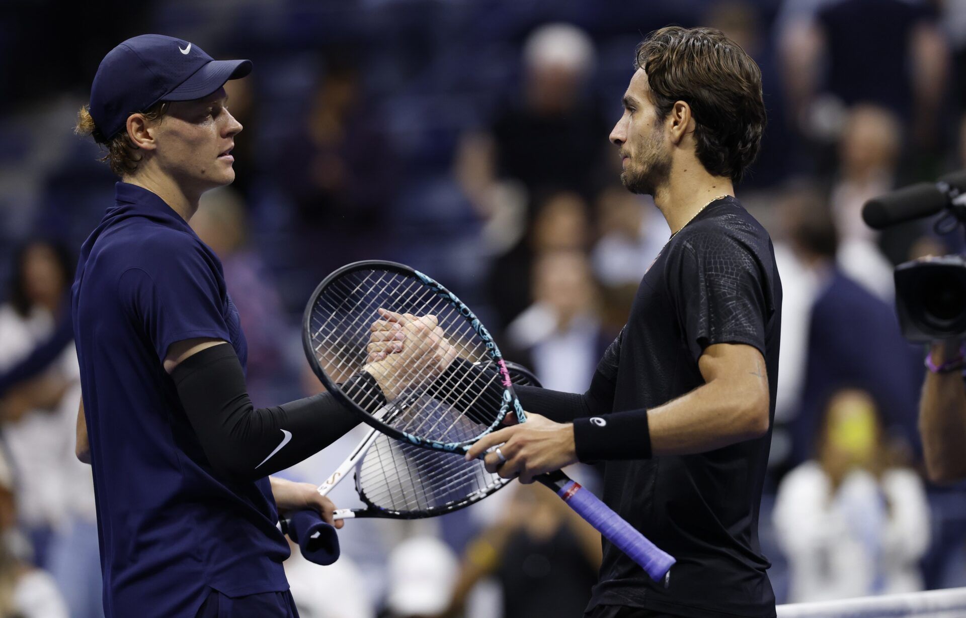 Jannik Sinner (ITA) greets Lorenzo Musetti (ITA) after defeating him on day eleven of the 2025 US Open tennis championships at USTA Billie Jean King National Tennis Center.
