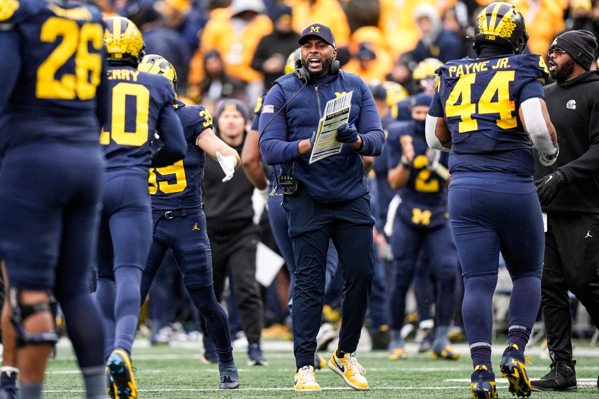 Michigan head coach Sherrone Moore cheers on at a timeout against Ohio State during the first half at Michigan Stadium in Ann Arbor on Saturday, Nov. 29, 2025.