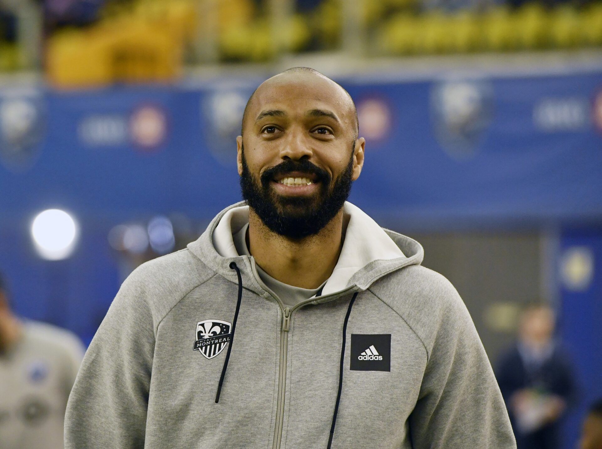 Montreal Impact head coach Thierry Henry walks the field before the game against the New England Revolution at Olympic Stadium.
