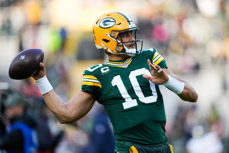 Green Bay Packers quarterback Jordan Love (10) warms up before the game against the Chicago Bears at Lambeau Field.