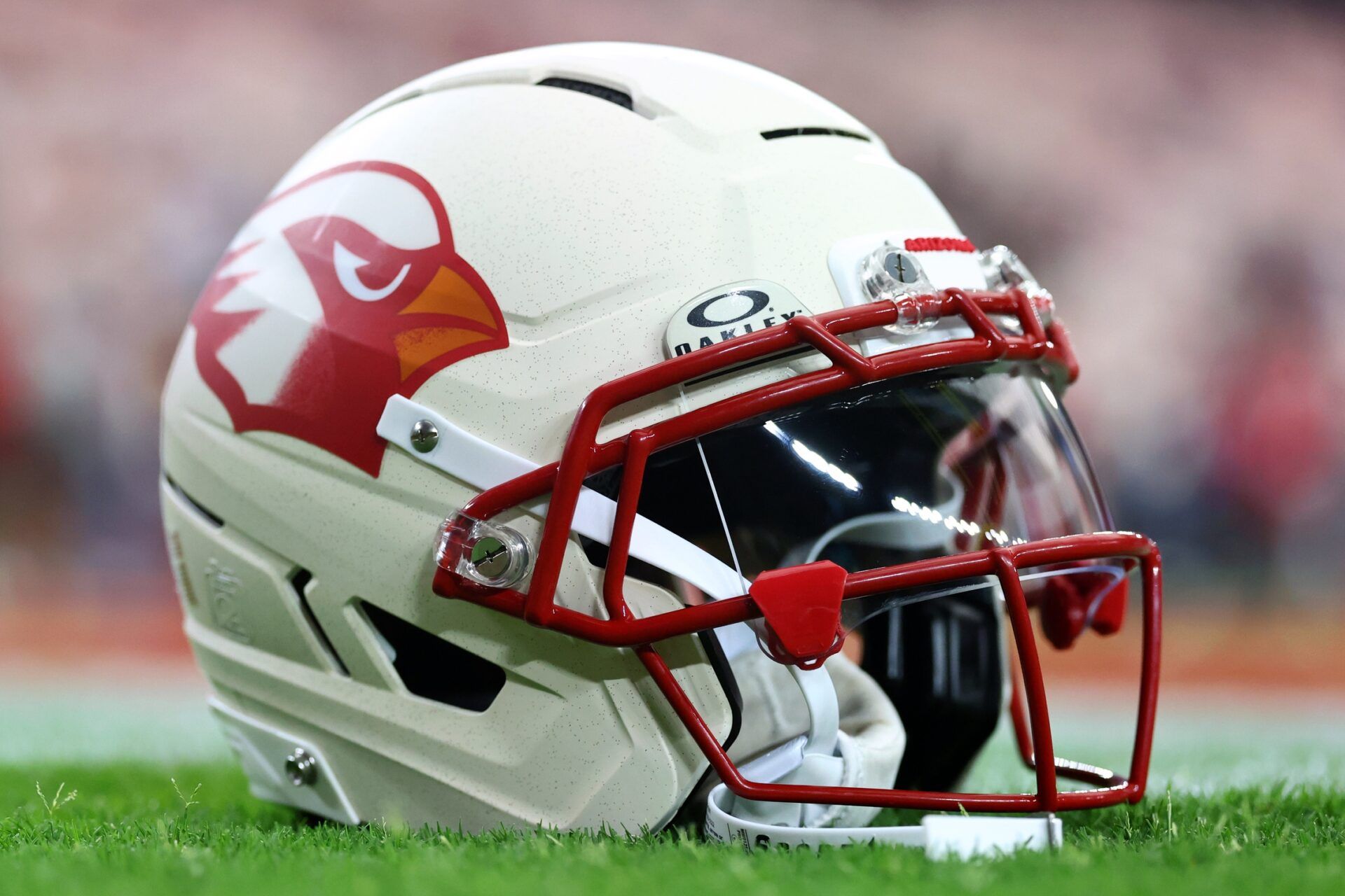 Detail view of the Arizona Cardinals helmet on the field before the game against the Seattle Seahawks at State Farm Stadium.