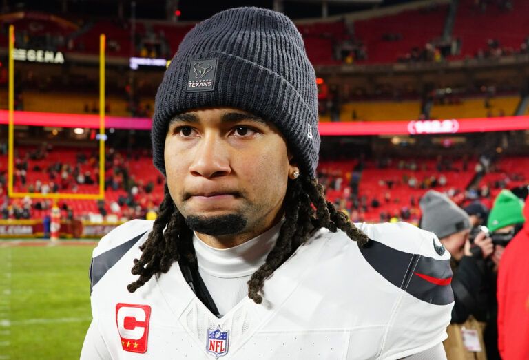 Houston Texans quarterback C.J. Stroud (7) walks off the field after the game against the Kansas City Chiefs at GEHA Field at Arrowhead Stadium.
