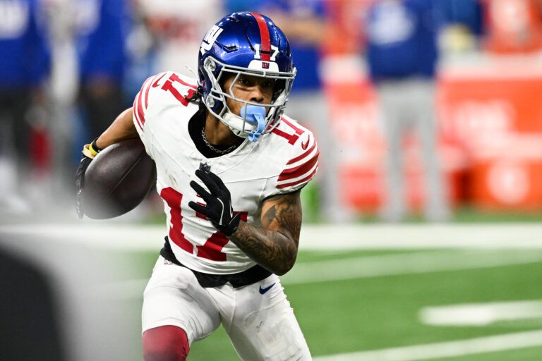 New York Giants wide receiver Wan'Dale Robinson (17) runs upfield after catching a swing pass in the second quarter against the Detroit Lions at Ford Field.