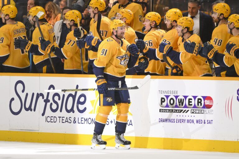 Nashville Predators center Steven Stamkos (91) celebrates with his teammates after scoring his forth goal against the St. Louis Blues during the second period at Bridgestone Arena.