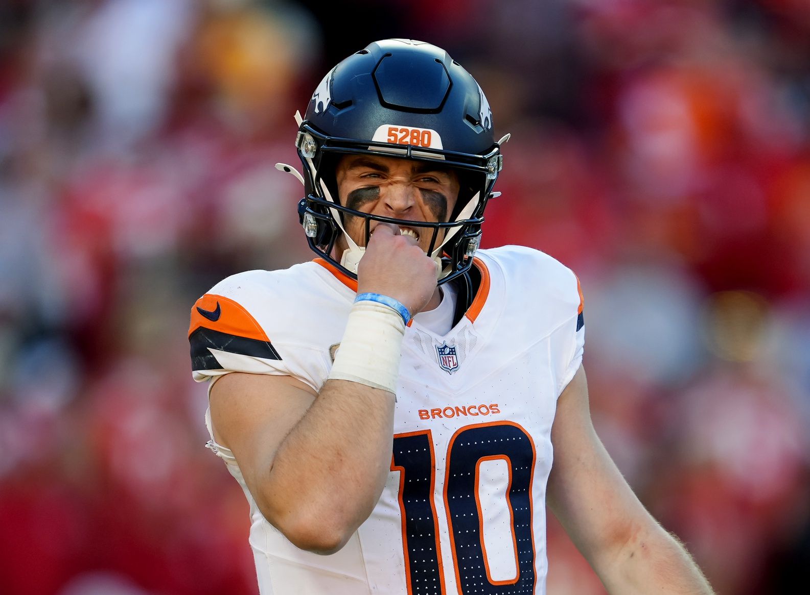 Denver Broncos quarterback Bo Nix (10) reacts during the second half against the Kansas City Chiefs at GEHA Field at Arrowhead Stadium.