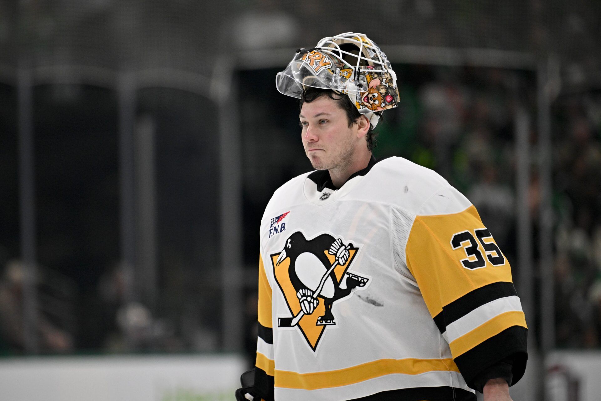 Pittsburgh Penguins goaltender Tristan Jarry (35) skates back on the ice during the second period against the Dallas Stars at American Airlines Center.