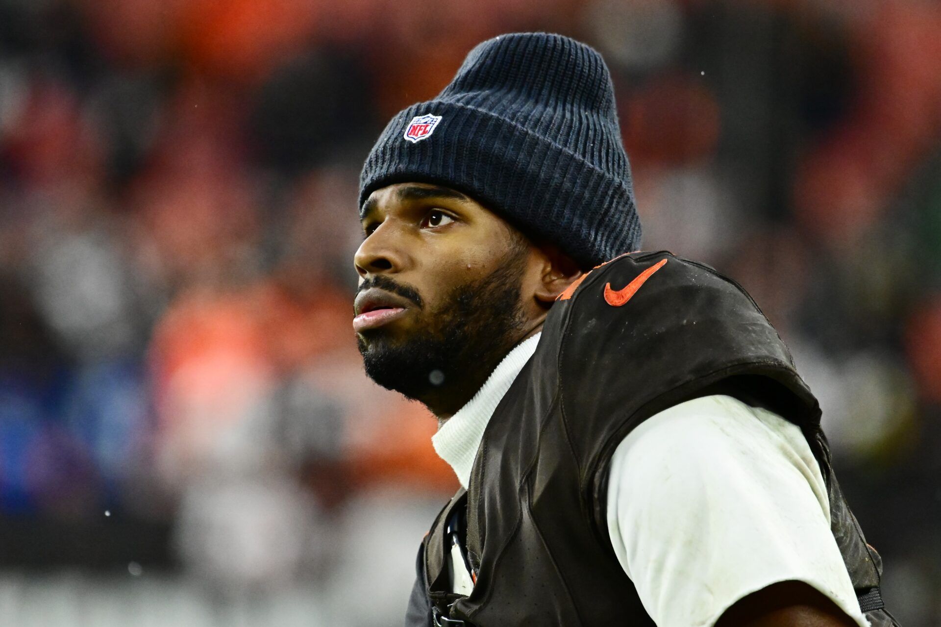 Cleveland Browns quarterback Shedeur Sanders (12) watches from the sidelines late in the fourth quarter against the Tennessee Titans at Huntington Bank Field.