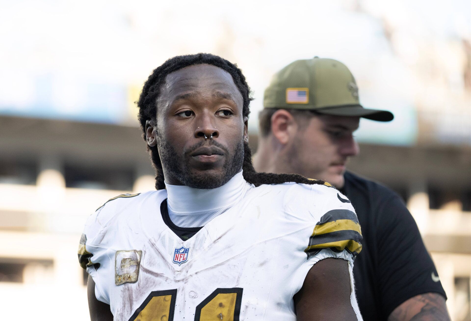 New Orleans Saints running back Alvin Kamara (41) walks off the field after the game at Bank of America Stadium.