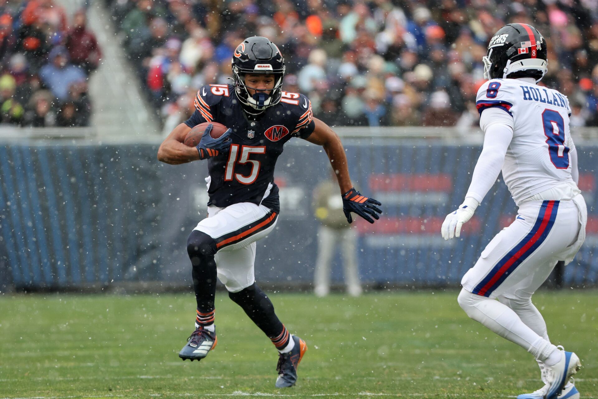 Chicago Bears wide receiver Rome Odunze (15) makes a catch against New York Giants safety Jevon Holland (8) during the first half at Soldier Field.